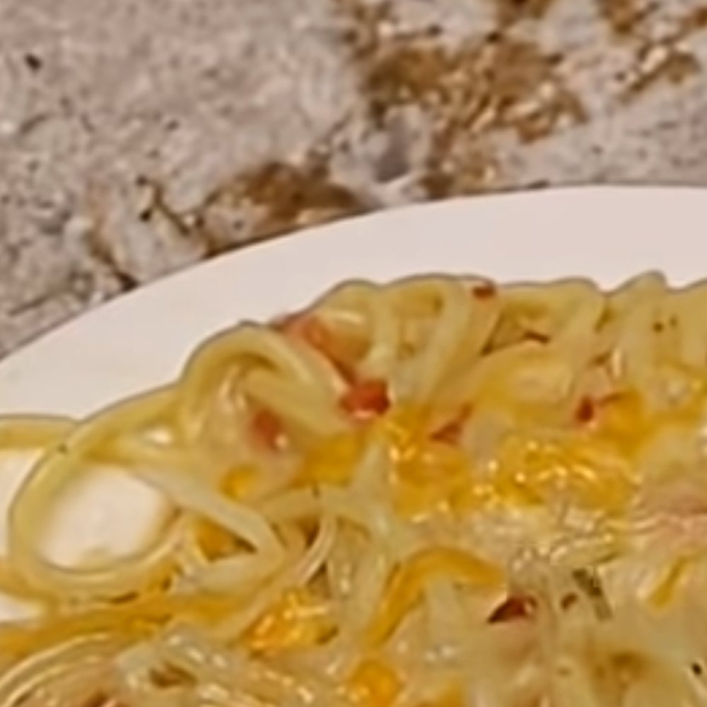 Creamy Dollar General chicken spaghetti lifted on a fork